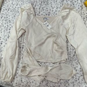 Pre-own EXPRESS Satin cream blouse, long sleeves, crop top style. Size xs